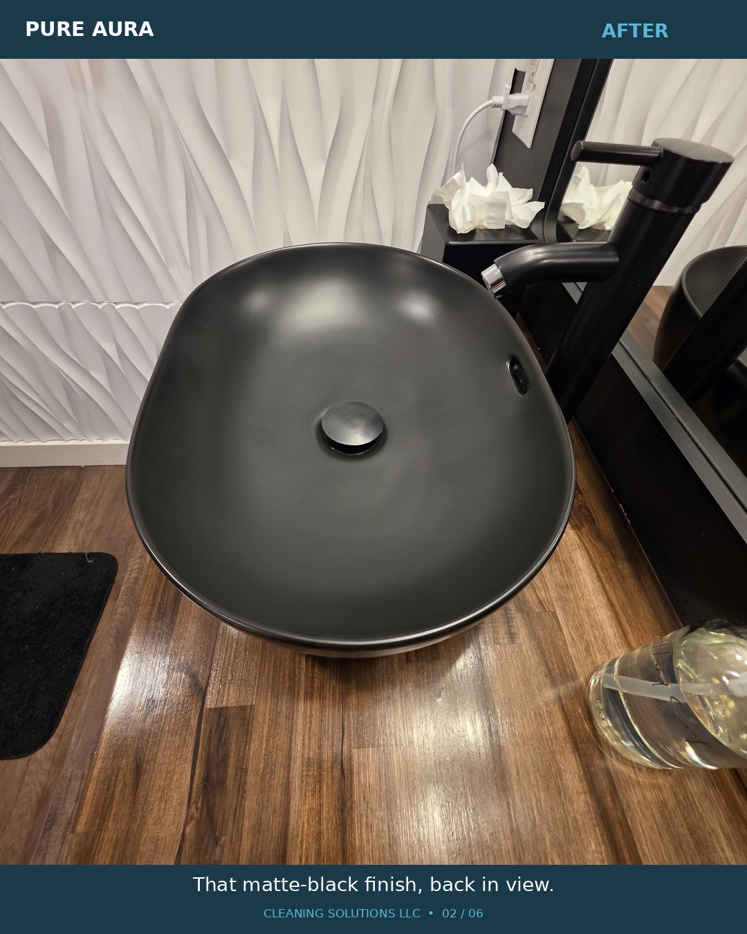 After cleaning: the black vessel sink with the visible water spots and residue removed.